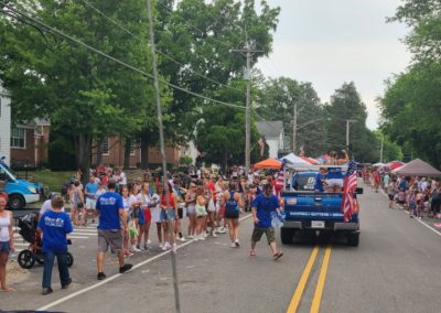 gen ex team handing out candy at 4th of July parade